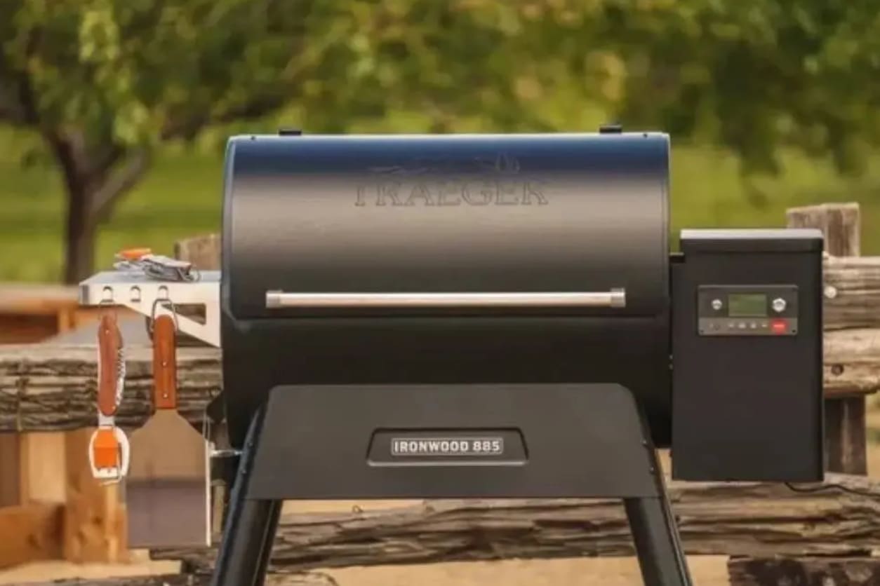 A grill sitting on top of a metal surface.